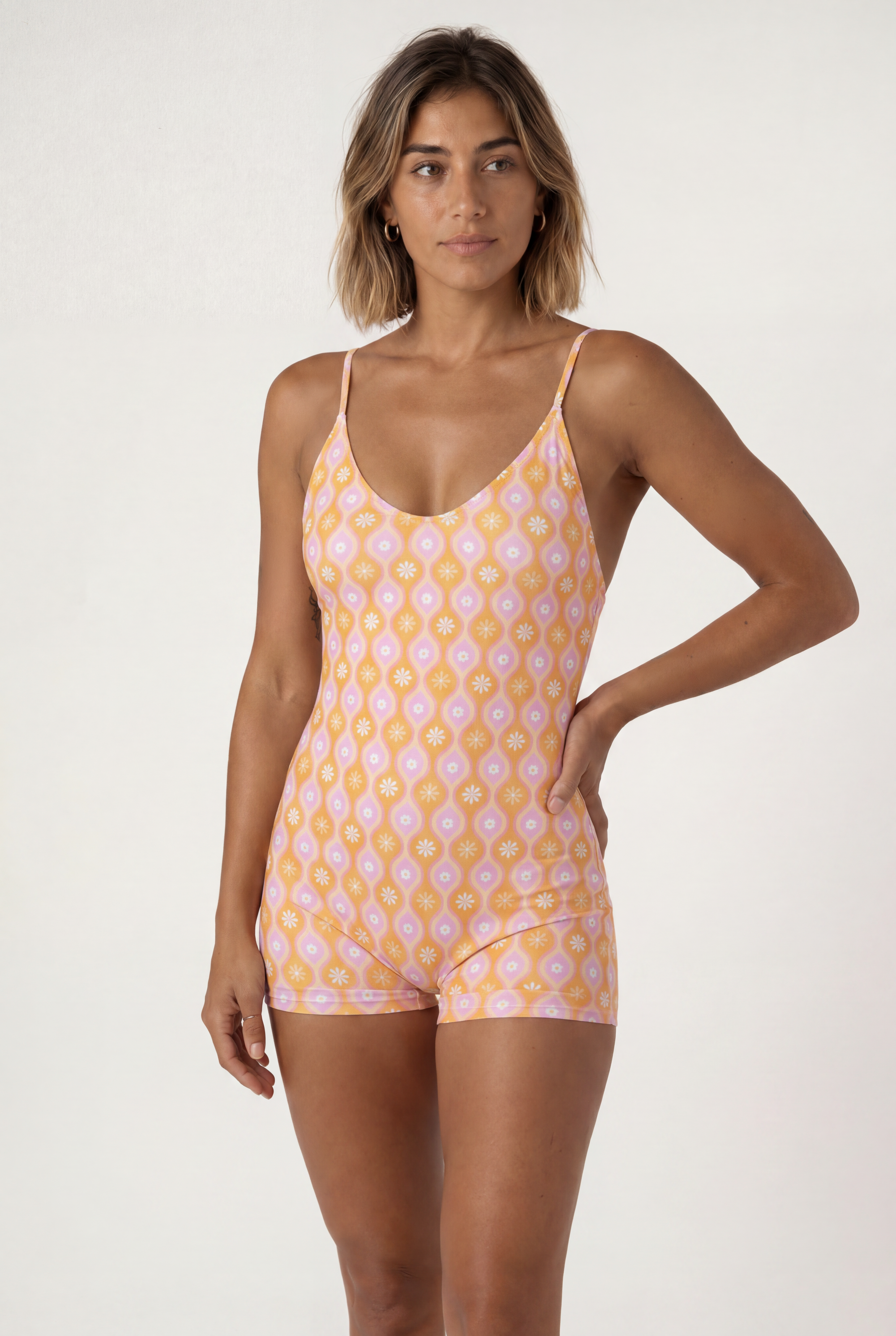 Mumi surf bodysuit Marga Orange – sustainable REPREVE® recycled swimwear | Ula