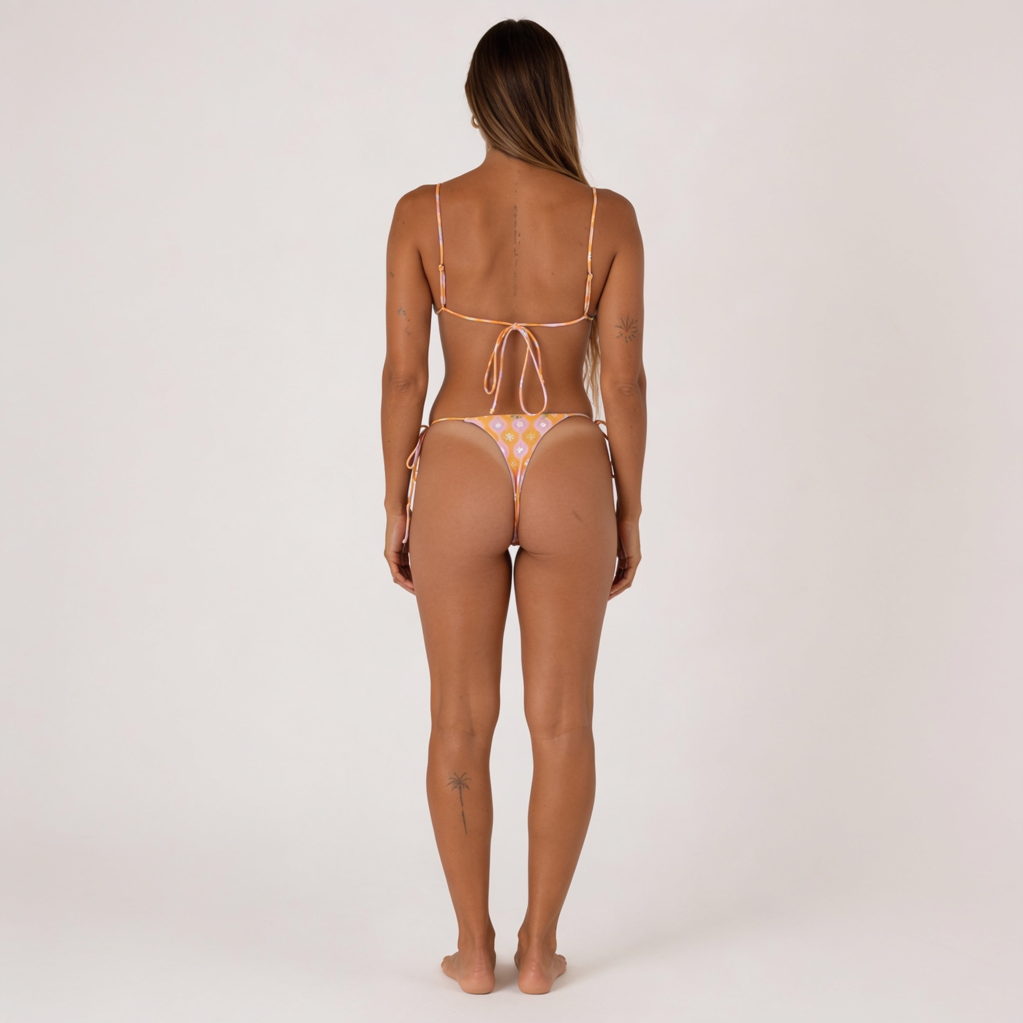 Banu reversible triangle bikini top Marga Orange – recycled REPREVE® swimwear | Ula